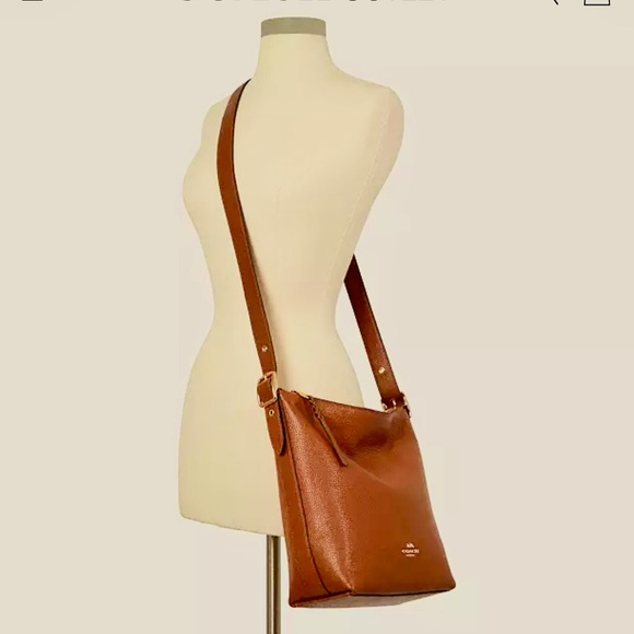 Coach Handbags - Women’s Coach Val Duffle bag in Redwood refunded pebble leather NWT. 9x11.5x4.5
